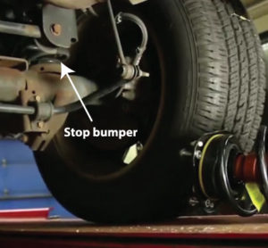 Check stop bumper condition before repalcing the strut assembly 